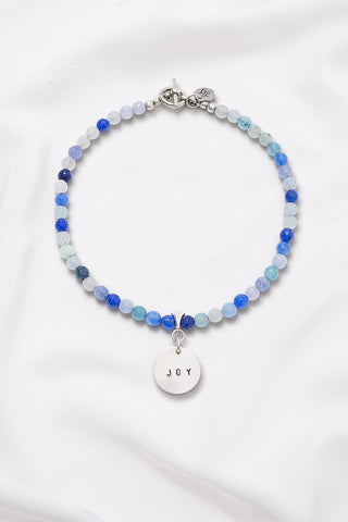 BLUE BRIGHT JOY NECKLACE WITH HAND STAMPED CIRCLE PENDANT (8MM)