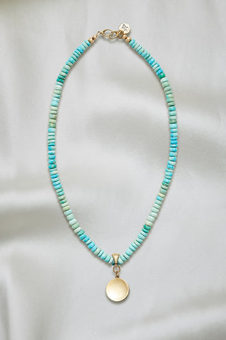 TURQUOISE NECKLACE WITH 14K GOLD CONCAVE CIRCLE PENDANT